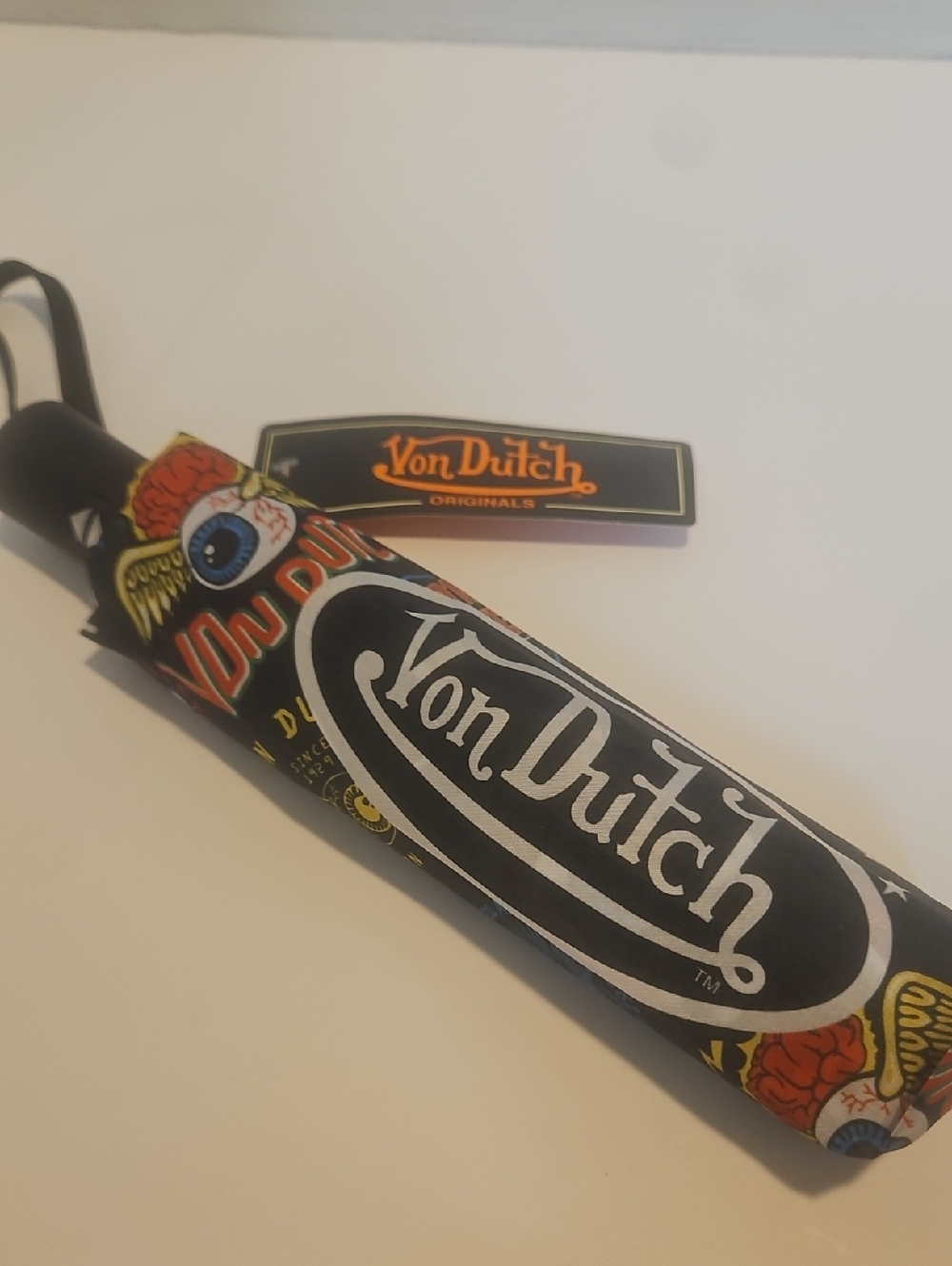 Von Dutch Black Umbrella with Tattoo-Style Red, Yellow, Blue & White Accents